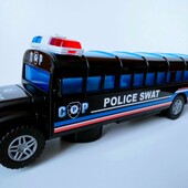 Музыкальный полицейский автобус,играет.светится и ездит.