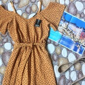 Жовто- гарячий комбінезон у горох.