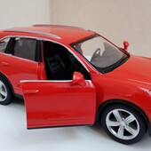 Дуже гарна та міцна металева інерційна машинка Porsche ,двері відкриваються