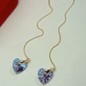 Невероятно красивые и нежные серьги протяжки с кристаллом Swarovski. Позолота 585 пробы 18К.