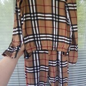 Стильний костюмчик в клітинку на 7-9 років. Стан нового.