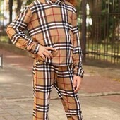 Стильний костюмчик в клітинку на 7-9 років. Стан нового.