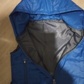 Жіноча стьобана жилетка з капюшоном р. 48 (синя)