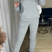 Жіночі теплі костюми.