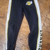 Фірмові спортивні штанці на 9-10,розмір 134-140
