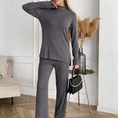 Костюми жіночі теплі.