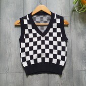 Тёплая женская жилетка