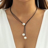 Кольє- протяжка на чорному шнурку, біле намисто