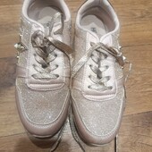 Кросівки рожеві