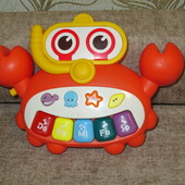 Музыкальная игрушка в отличном состоянии