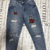 Жіночі джинси з потертостями