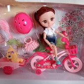 Дуже гарна шарнірна лялечка на велосипеді