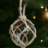 Новорічна велика прозора куля, декорована макраме