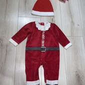 Чоловічок новорічний з шапочкою,на зріст 74см.