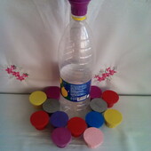 Пластикова насадка - ситечко на любу пляшку для поливу квітів. Багато різних лотів.