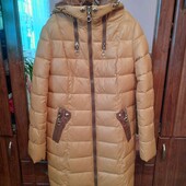 Пальто пуховик нове .