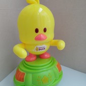 Цікава музична іграшка курчатко,світло,звук, рухається від батарейок