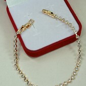 Нежный и очень красивый браслет 17-18,5 см, дорожка фианитов.Позолота 585 пробы 18К.