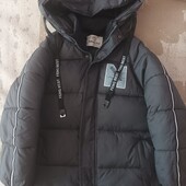 Куртка зимова на хлопця 7-9 років.