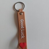 Брелок з побажанням удачі
