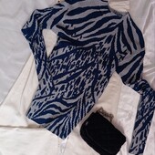 Якісний та приємний до тіла гольф в рубчик з горловиною стійка