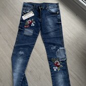 Джинси з вишивкою