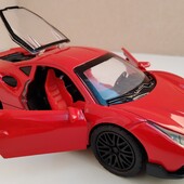 Дуже гарна металева інерційна машинка,двері відкриваються