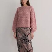 Ажурний джемпер в пастельно рожевому кольорі з суміші мохеру та вовни. в