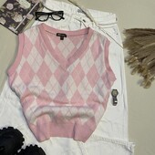Стильний жилет у рожевих тонах