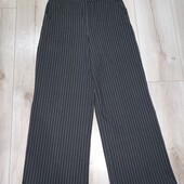 В ідеалі.Штанці палаццо у смужку розмір ХS.