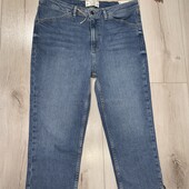 Нові з біркою.Джинсові капрі розмір 14.