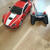 Машинка на пульт.управлении. 32 см . На батарейках.