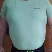 Новая котоновая футболка. Пог- 55,5 см. Тянется