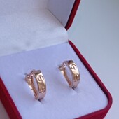 Очаровательные серьги колечки в стиле Cartier Love. Позолота 585 пробы 18К.